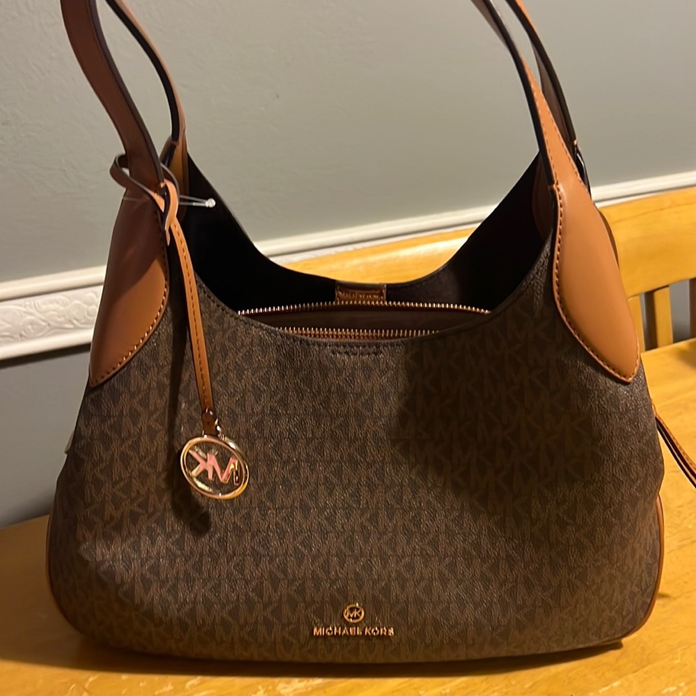 Michael Kors signature purse. New. Never used.